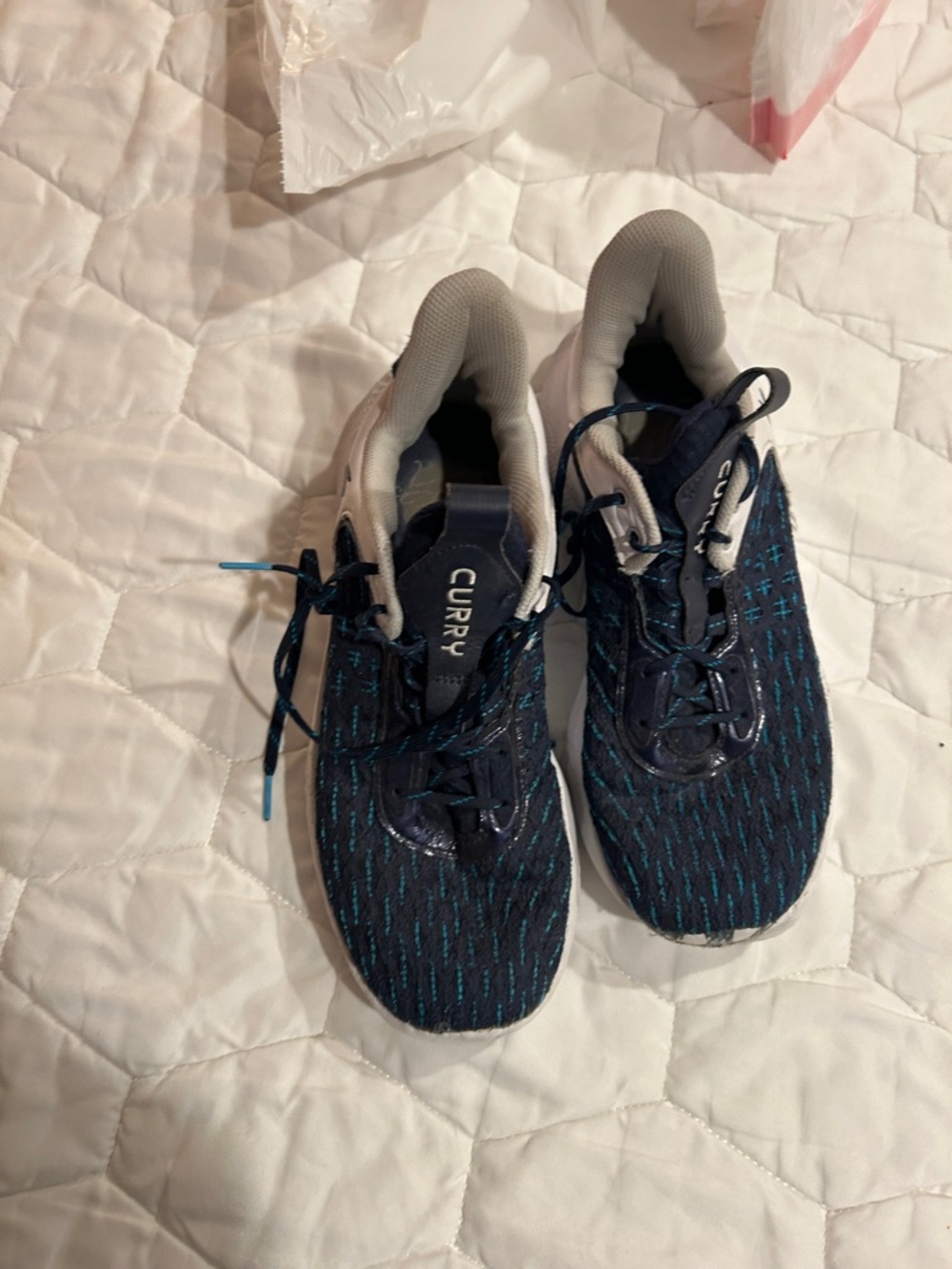 Under Armour Curry Kids' Athletic Shoes in Navy with Teal Accents